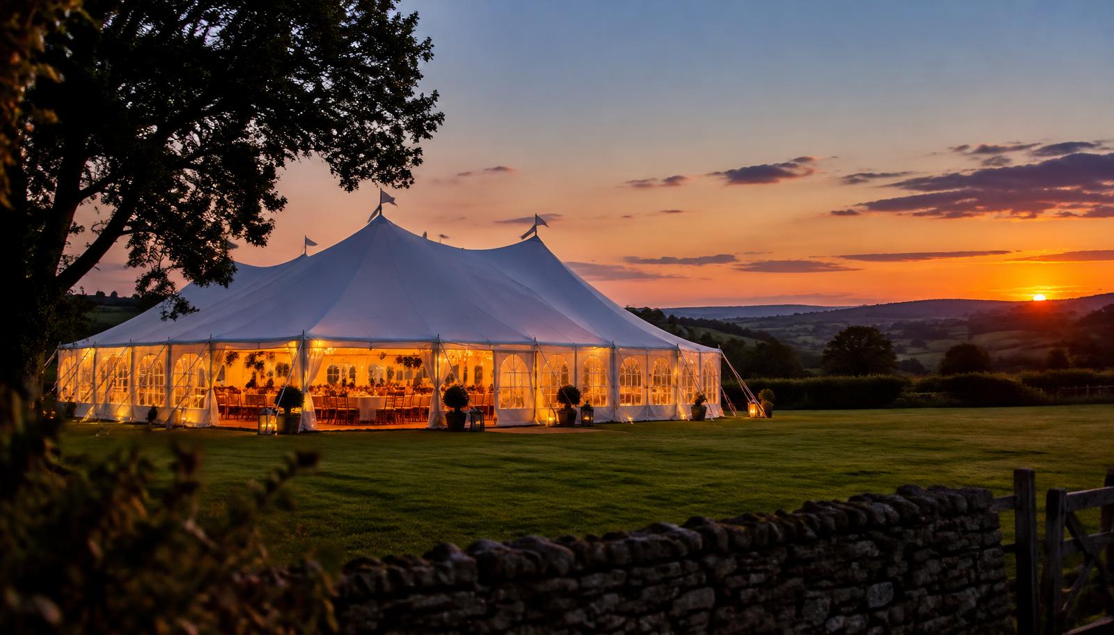Evermoore Marquee glowing at dusk